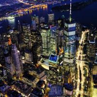  Arial view of NYC skyline at night