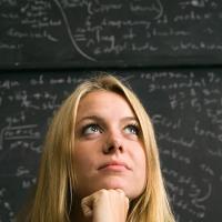 Student with math equations