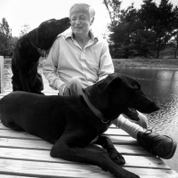 James McConkey, professor of English, with dogs.