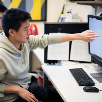  Students work in the Milstein Program offices in Rockefeller Hall.