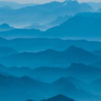 Blue mountains recede into the distance