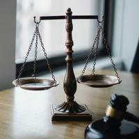 Scale and gavel on a desk