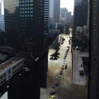  Tall buildings overlook a flooded street in New Orleans