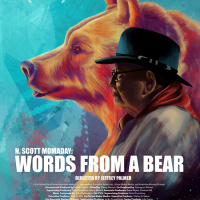 Film poster of a man and a bear facing forward side by side