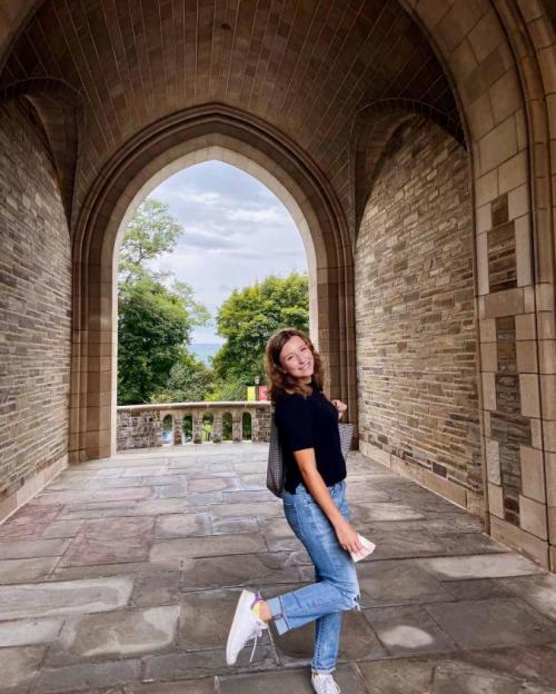 girl in Cornell archway