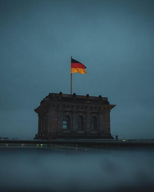German flag on top of Berlin Reichstag