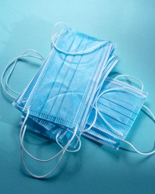 a pile of surgical masks