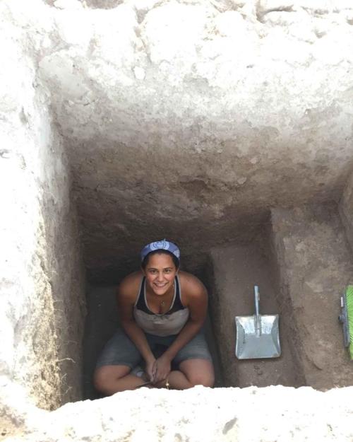 woman at archaeological dig