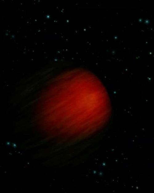 very dim red sphere – a planet – in dark space