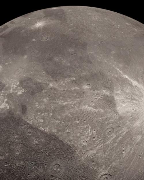 		Grey sphere backed by the darkness of space
	