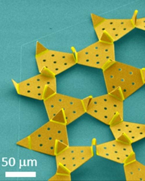 		Yellow metal array of almost-triangles on a blue-green background
	