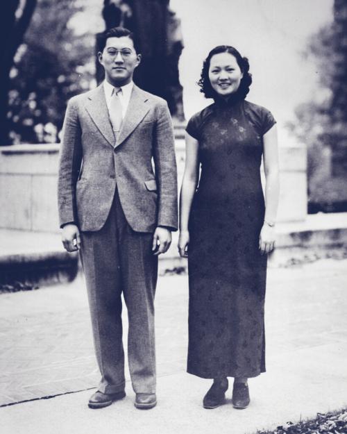 Two people, dressed well in a 1940 historical photo