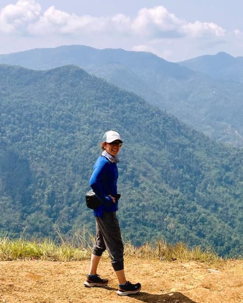 		person on top of mountain
	