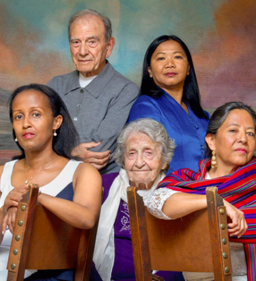 Five people wearing colorful clothes