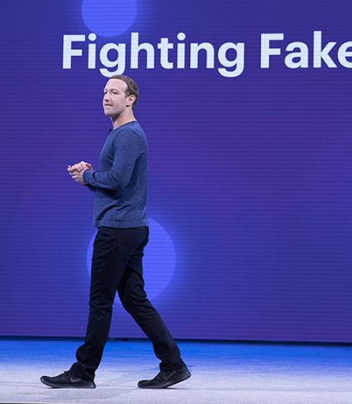  Person wearing blue on a stage