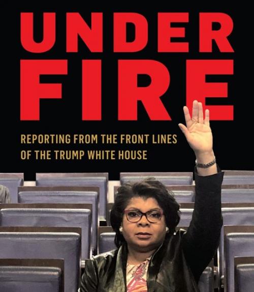 Cover of &quot;Under Fire&quot; book, with April Ryan holding her arm up to ask a question