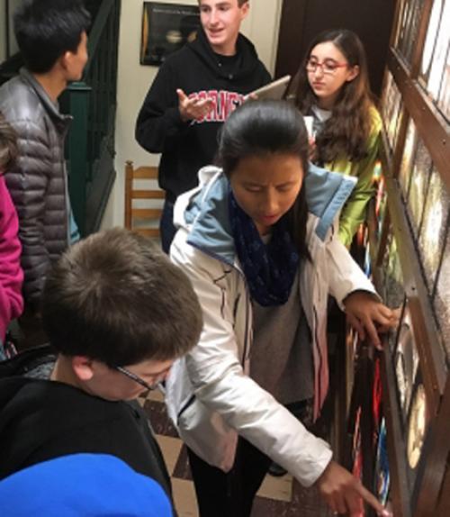  students looking at displays at the observatory