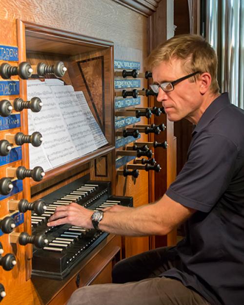 Person playing an organ