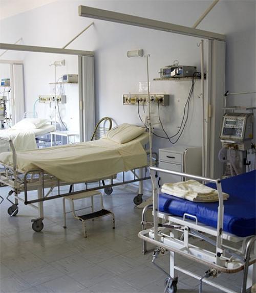  Row of empty hospital beds