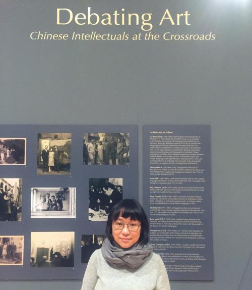 Yuhua Ding in front of her exhibition