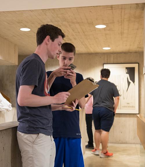Summer scholars take part in a scavenger hunt at the Johnson Museum