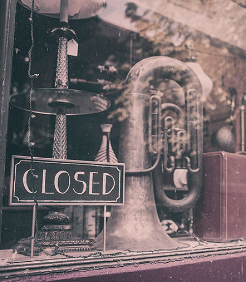  Closed sign in store window