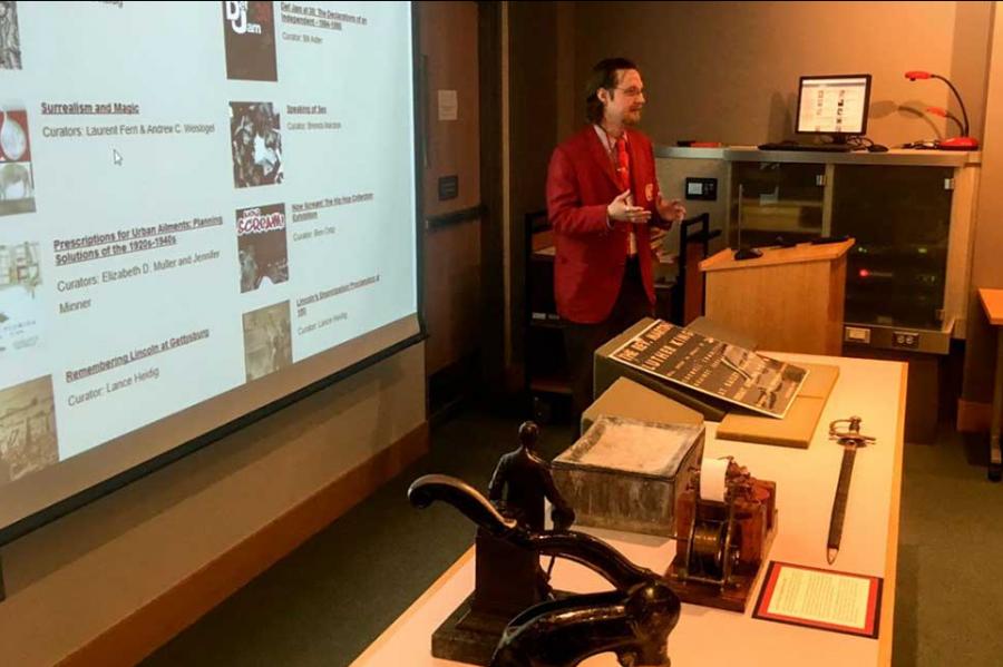 Person teaching from a podium