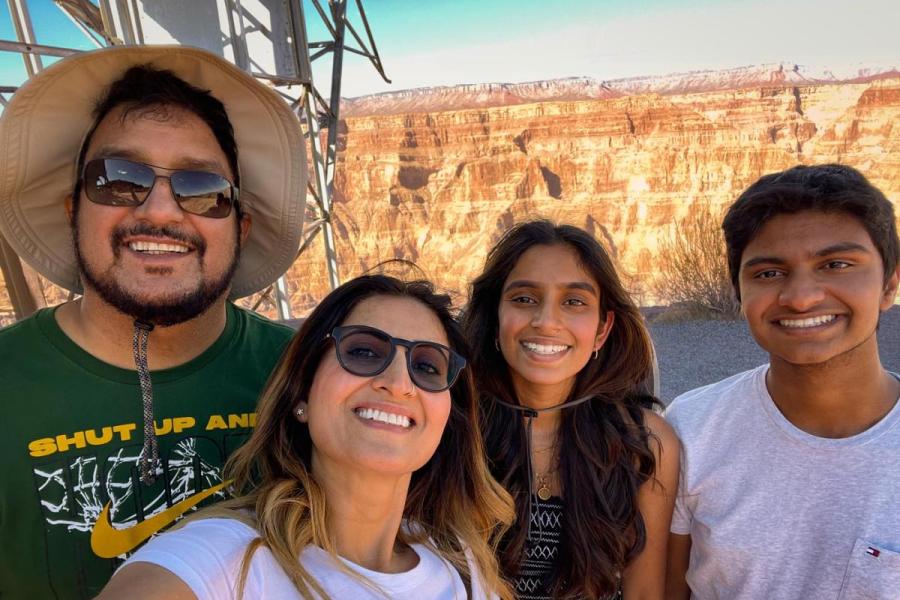 family in front of Grand Canyon