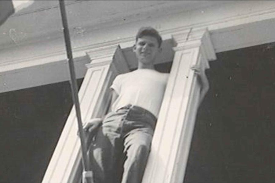 man on balcony