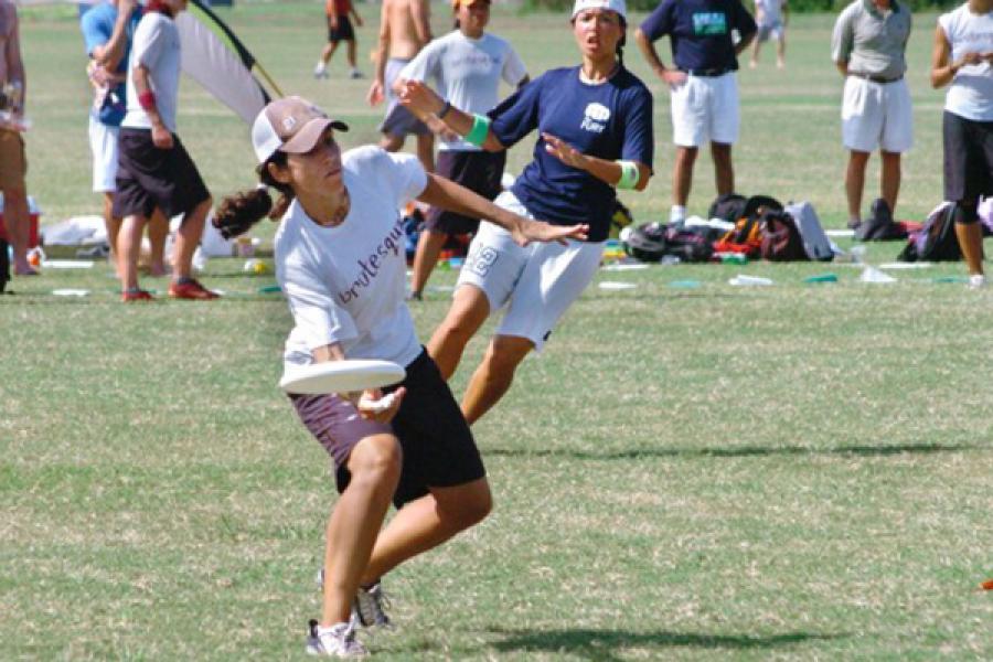 Person in shorts on a playing field