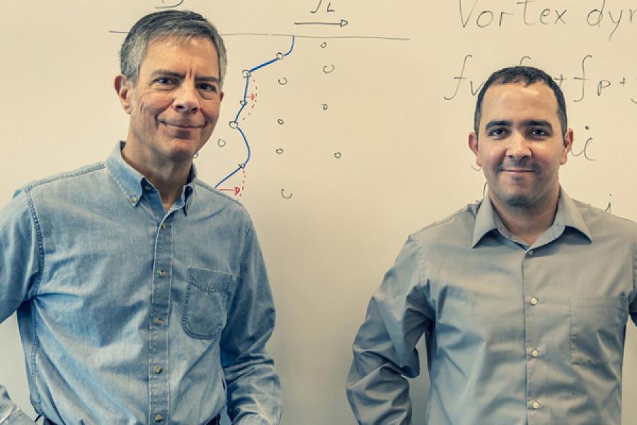 Professor James Sethna, left, and postdoctoral theorist Danilo Liarte, both members of the Center for Bright Beams, are working toward more efficient particle accelerators.