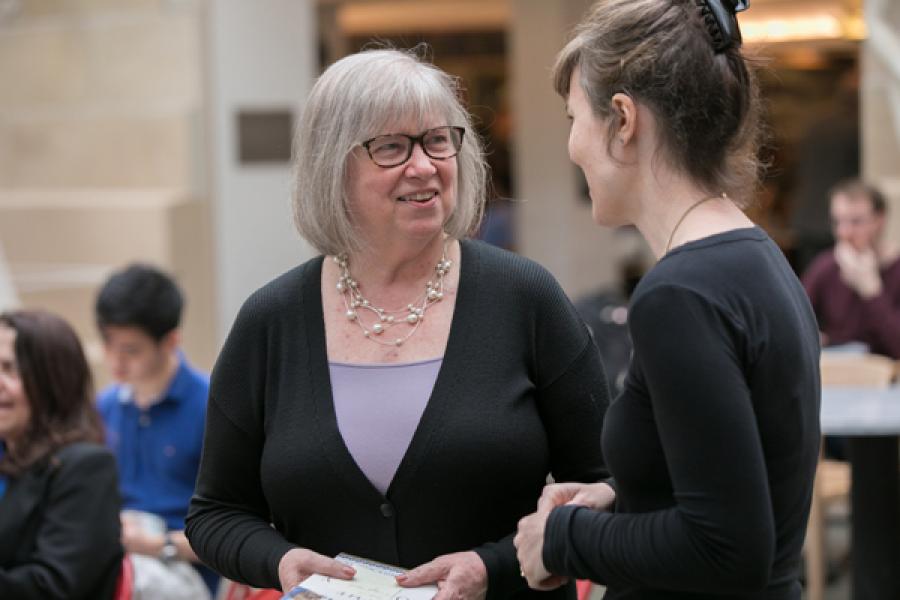Assemblywoman Barbara Lifton talks to Odyssey organizer Athena Kirk, assistant professor of classics