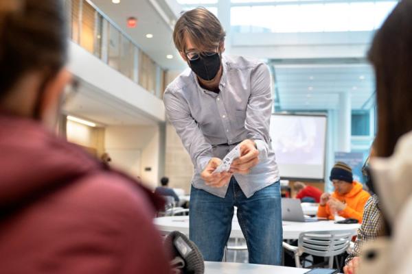 Michael Reynolds, M.S. ’17, Ph.D. ’21, postdoctoral associate in the Smith School of Chemical and Biomolecular Engineering in the College of Engineering, demonstrated an origami model of a nanobot.