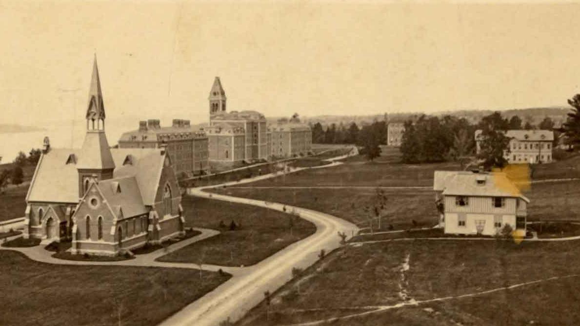 an old photo of a group of buildings