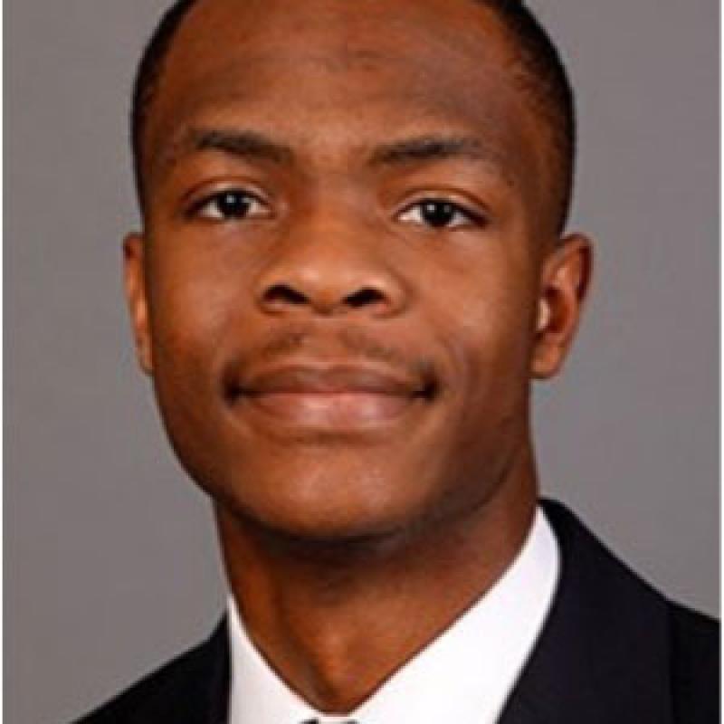 Solomon Lawrence '21 in a suit and tie, portrait style.
