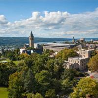 View of Cornell campus from above; under a blue sky