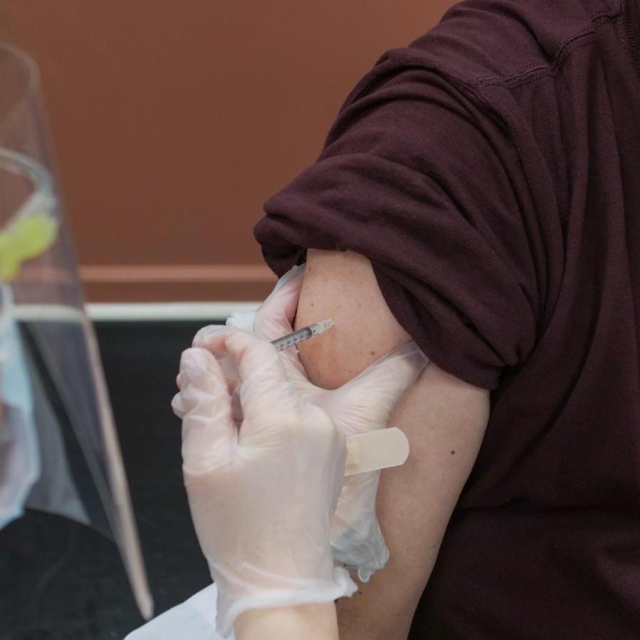 Person receiving vaccine