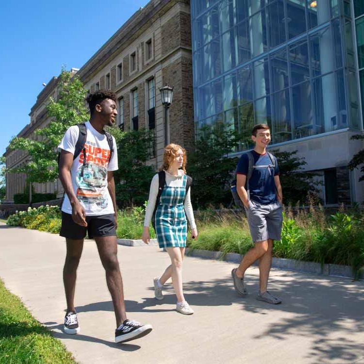 		Students in the Pre-Collegiate Summer Scholars Program walking past the Physical Sciences Building
	