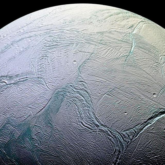 The frozen ocean world of Enceladus, a moon of Saturn.