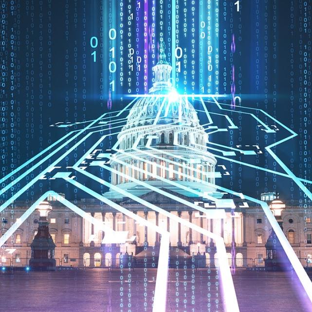 		Illustration of zeros and ones illuminated over a photo of the U.S. Capitol Building at night
	