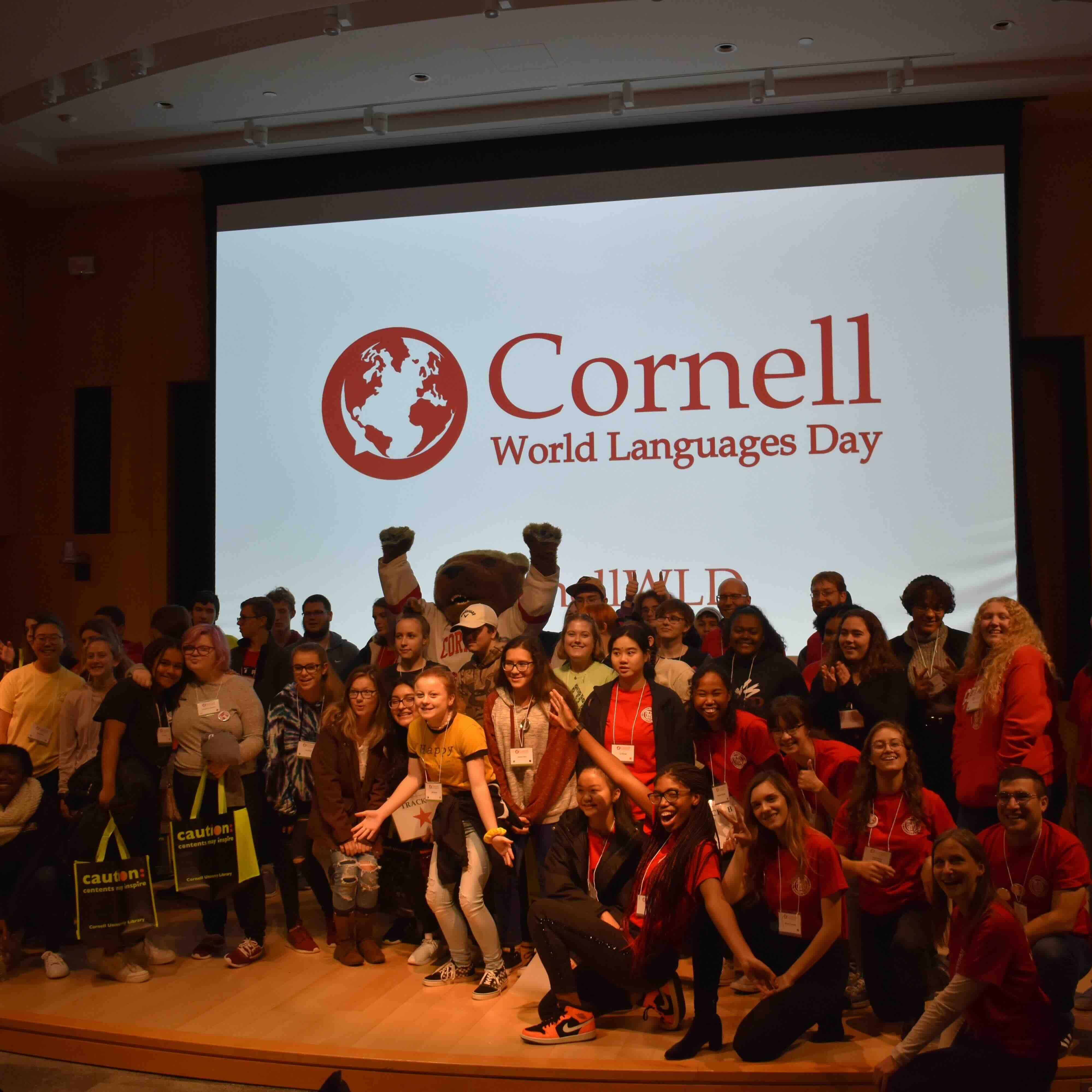 Students in front of Screen that says Cornell World Languages Day