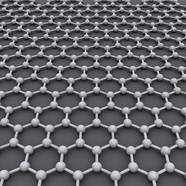 		A field of connected hexagons against a dark gray background
	