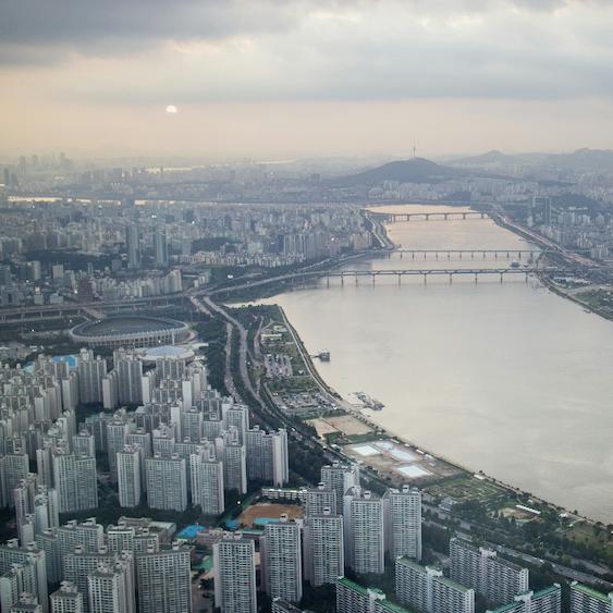 		A wide river running through a city
	