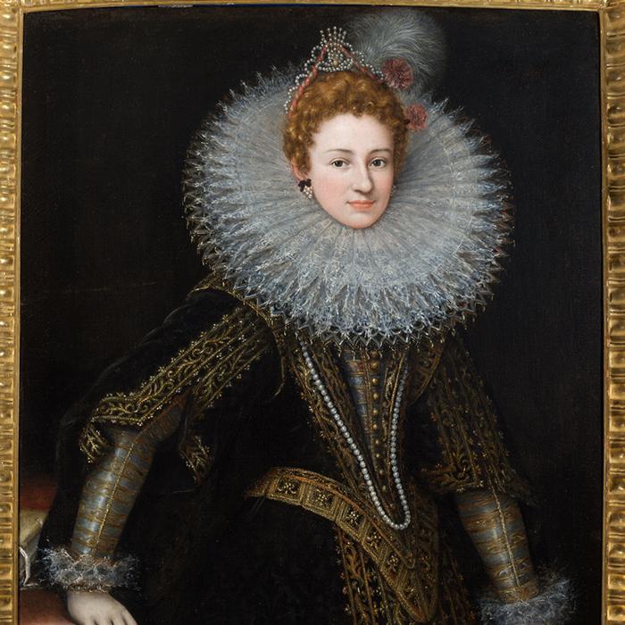 		A painted portrait, from the 17th century, of a confident looking woman wearing an elaborate ruff and dark colored gown
	