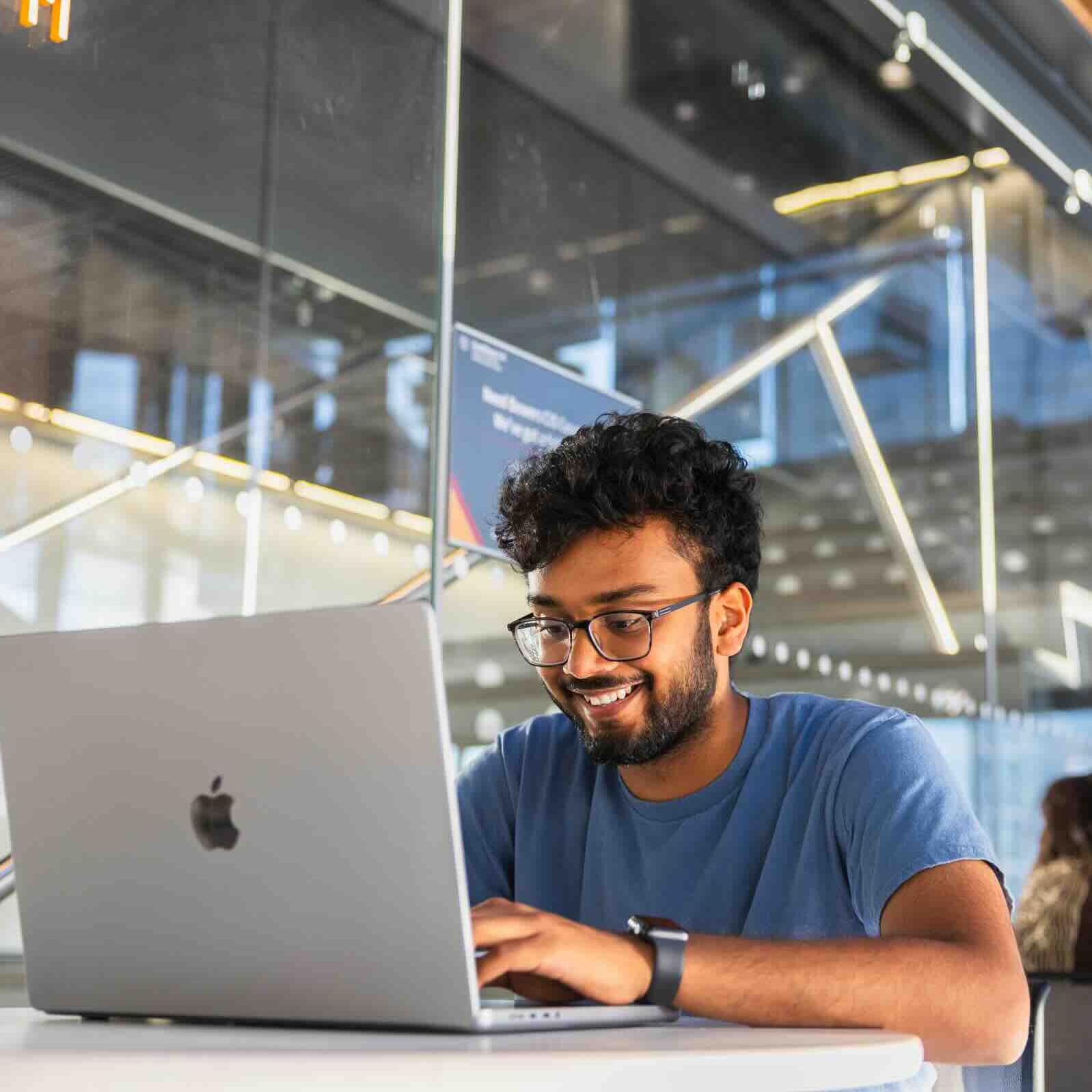 		person sitting at computer
	