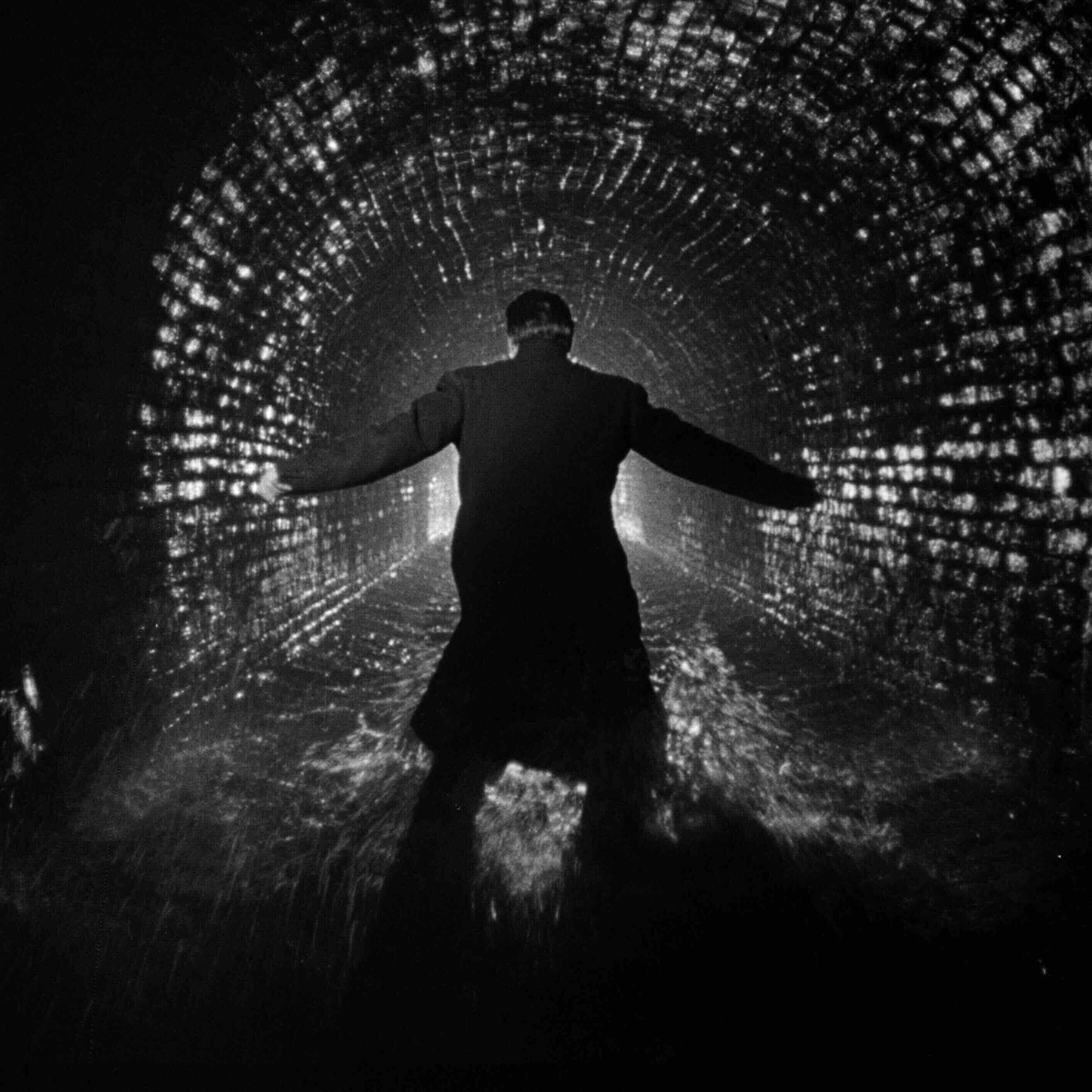 person in tunnel 