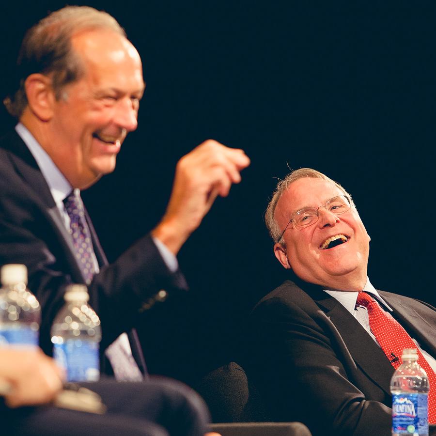 		Two people laughing together
	