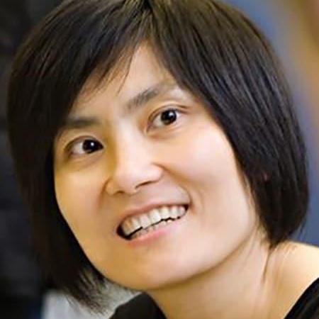 Jane Wang's face, with short dark hair and a smile.