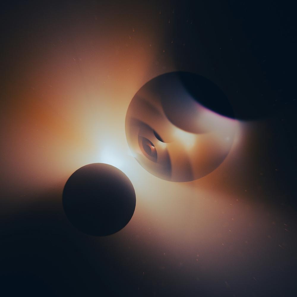 		Three spheres near each other, light between
	