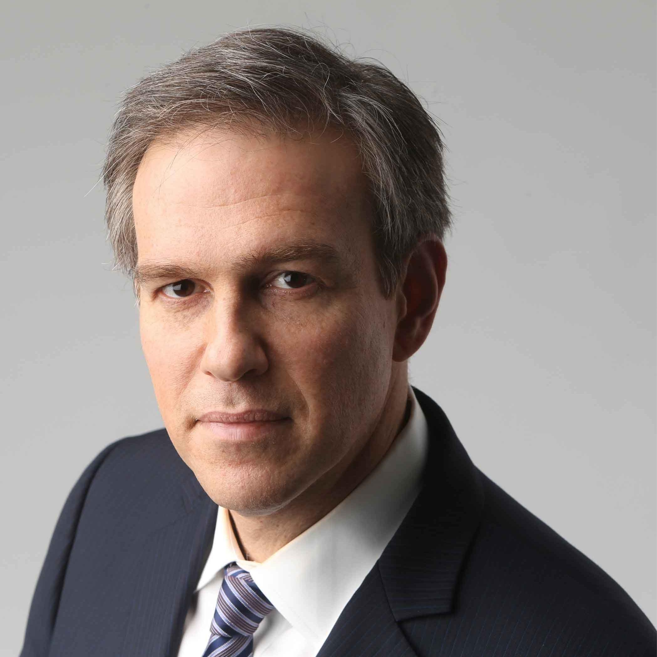 Bret Stephens in suit and tie. 